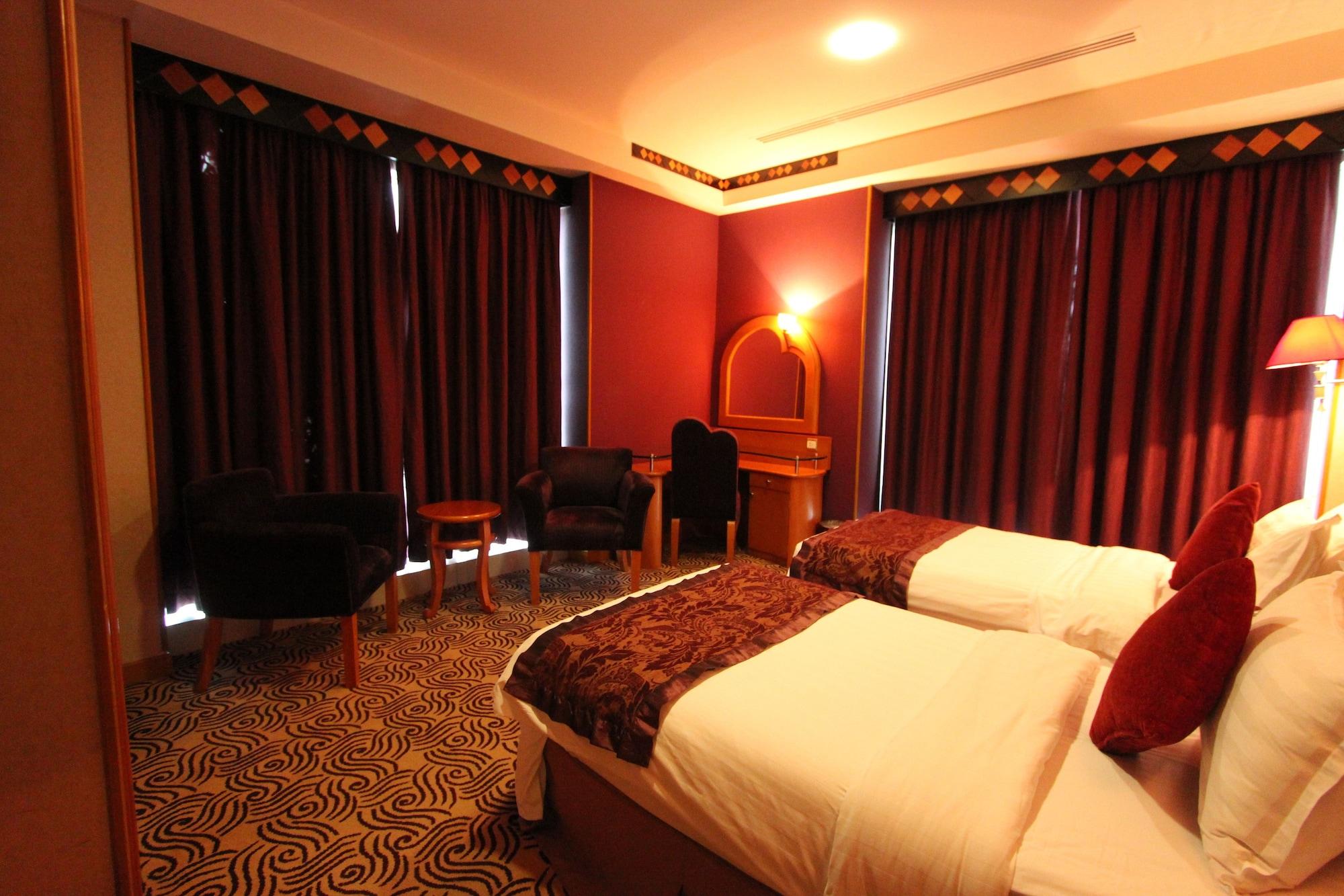 Awaliv International Hotel Таиф Екстериор снимка A room at the hotel
