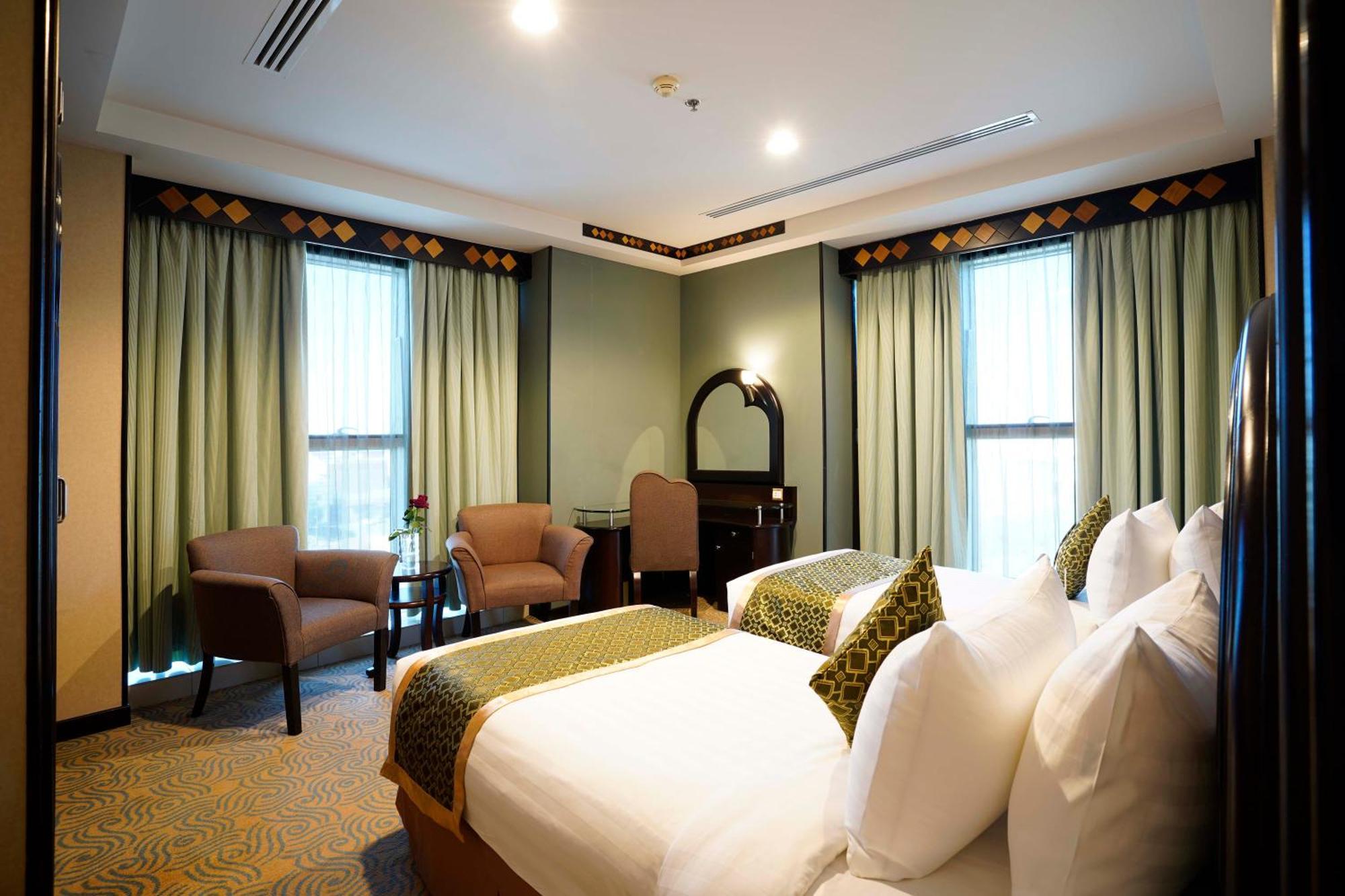 Awaliv International Hotel Таиф Стая снимка A bedroom at the hotel